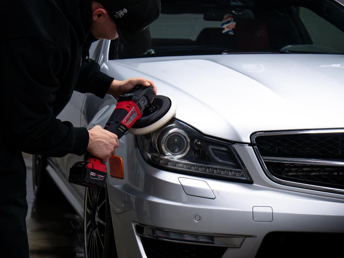 Machine polishing a vehicle at Stelter Solutions